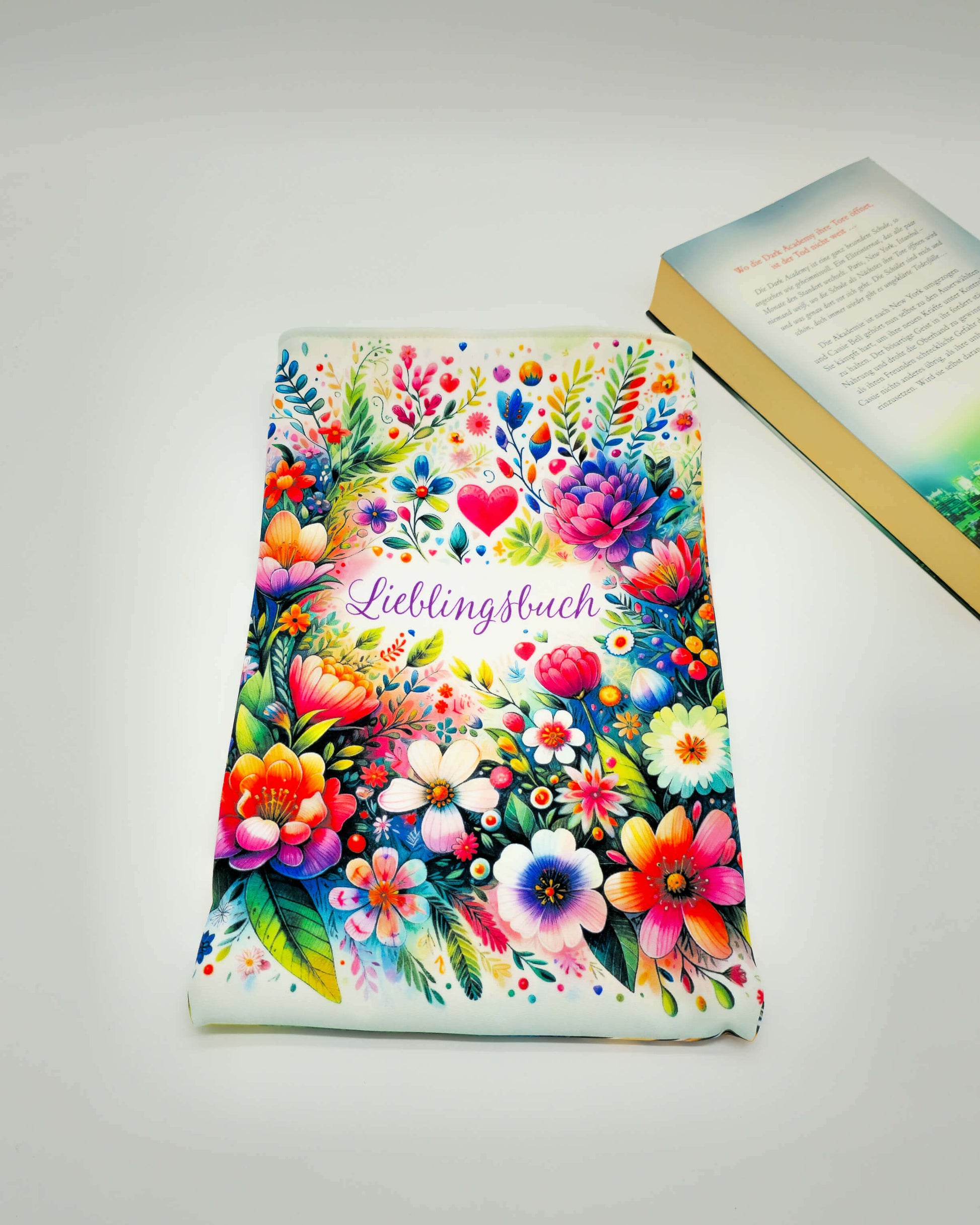Doppelseitige Buchhülle aus Softshell mit farbenfrohem Design