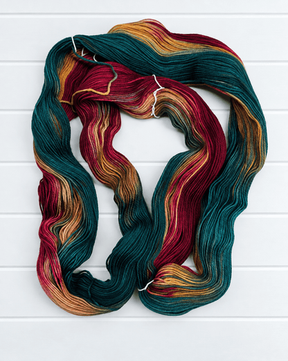 KnitPro Symfonie Terra Old Dehli Sockenwolle in Petrol, Bordeaux, Gold und Beige
