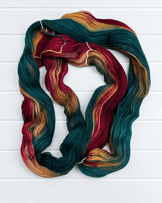 KnitPro Symfonie Terra Old Dehli Sockenwolle in Petrol, Bordeaux, Gold und Beige